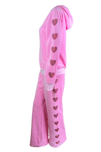 pink velour tracksuit with red rhinestone hearts down the arms and legs.  2 piece velour sweatsuit with custom rhinestones.