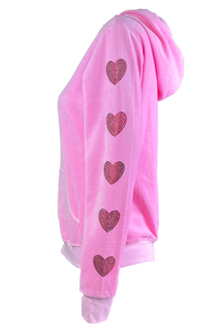 pink velour track jacket with red rhinestone hearts down the arms and legs.   Velour sweatshirt with custom rhinestones.