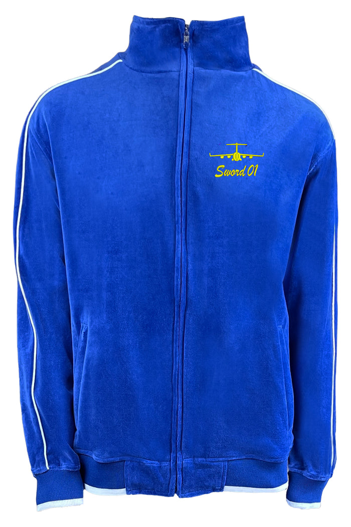 Royal Blue velour track jacket with white trim, custom embroidered c-17 and name on the front chest, Volens et Potens logo embroidered on the back and swords embroidered down the side of the arms and legs.
