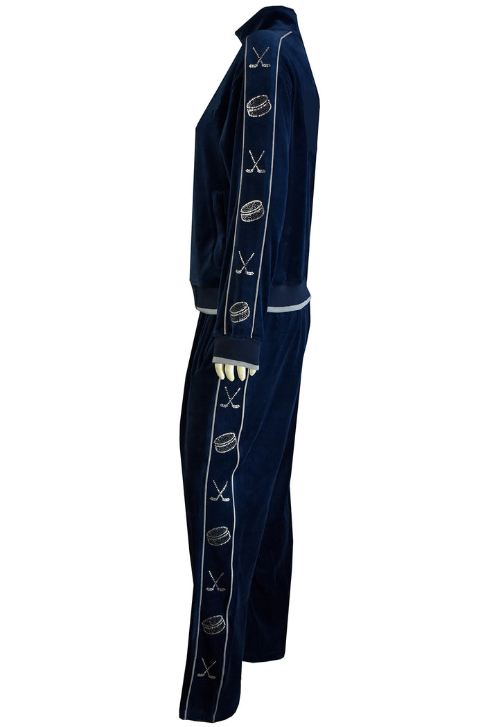 navy blue velour tracksuit with rhinestone hockey pucks, custom embroidery on the front chest or back is optional. sweatsuit, sweatsedo, velour, custom rhinestones, hockey sticks, pucks